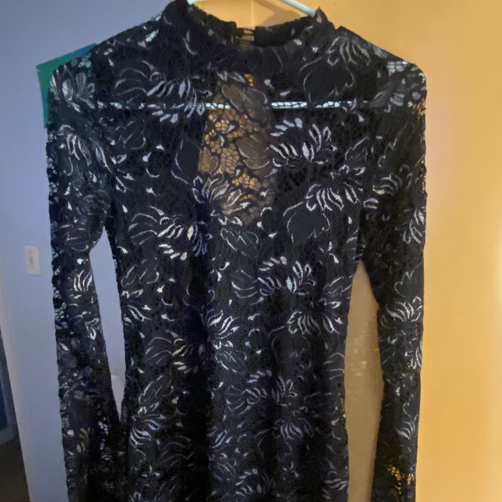 Sexy little black dress with lace design